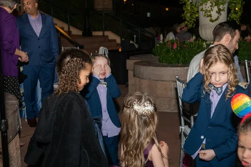 A candid photo of 4 people